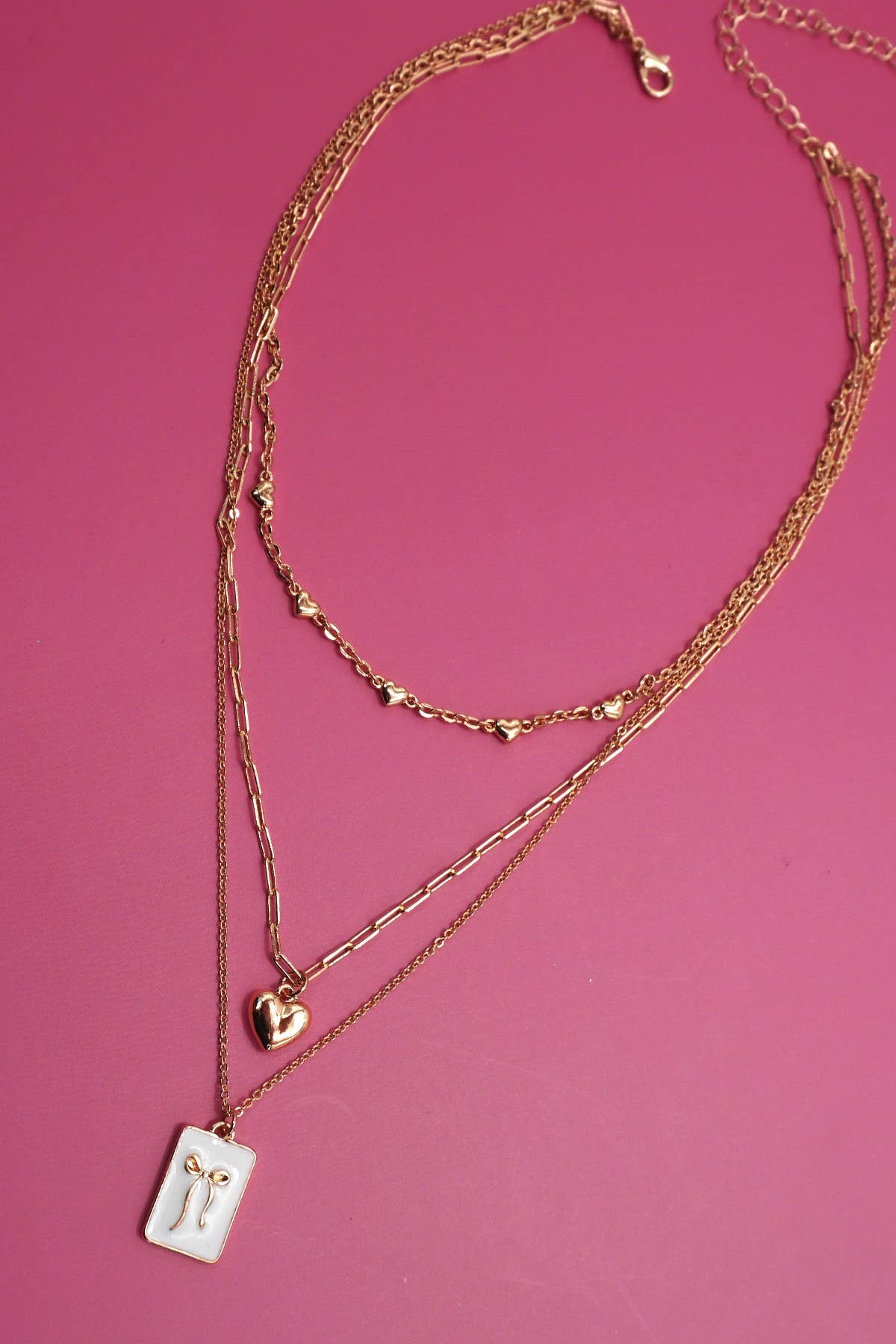 Bow charm necklace