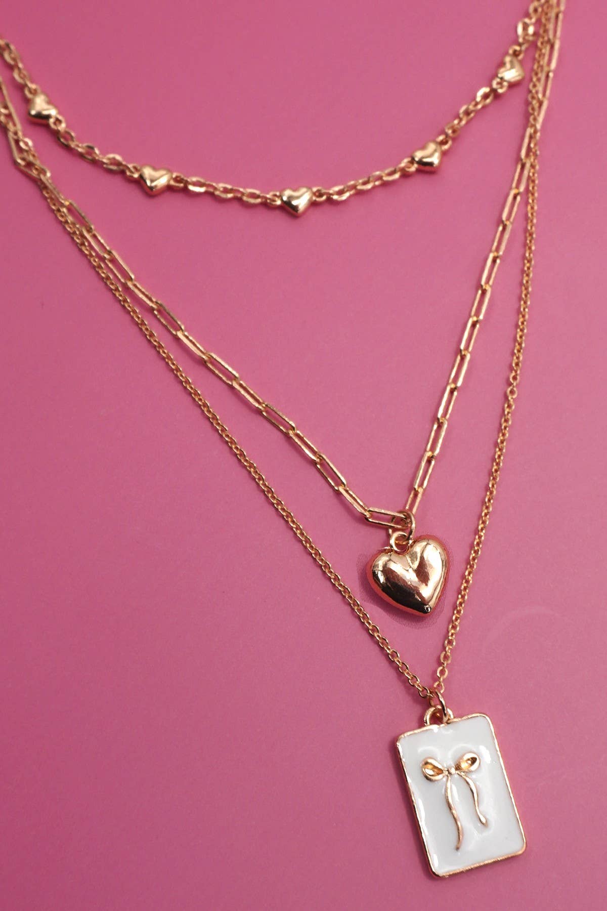 Bow charm necklace